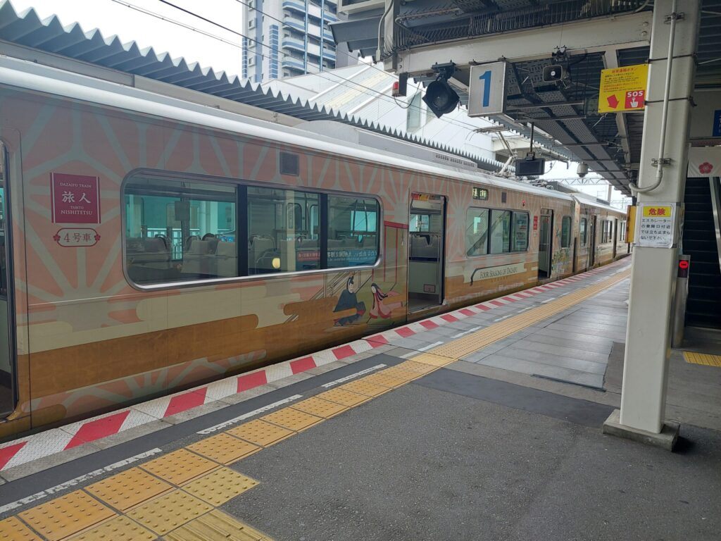 Sightseeing train Tabito at Nishitetsu Futsukaichi Station, connecting to the Dazaifu Line.