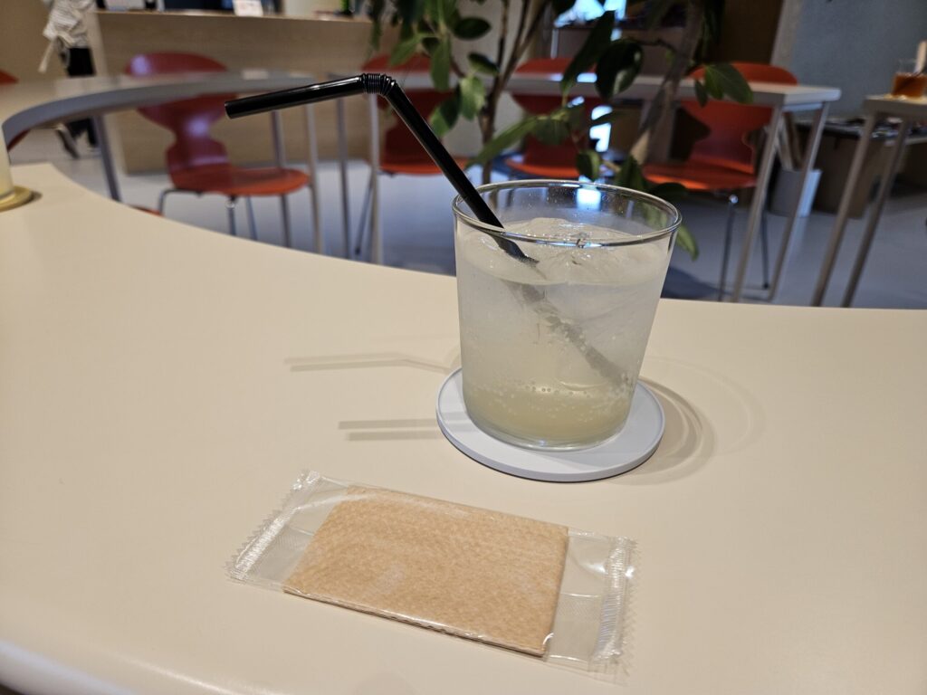 Lime fruit syrup soda served at Café Si, a stylish café near Kamado Shrine in Dazaifu.