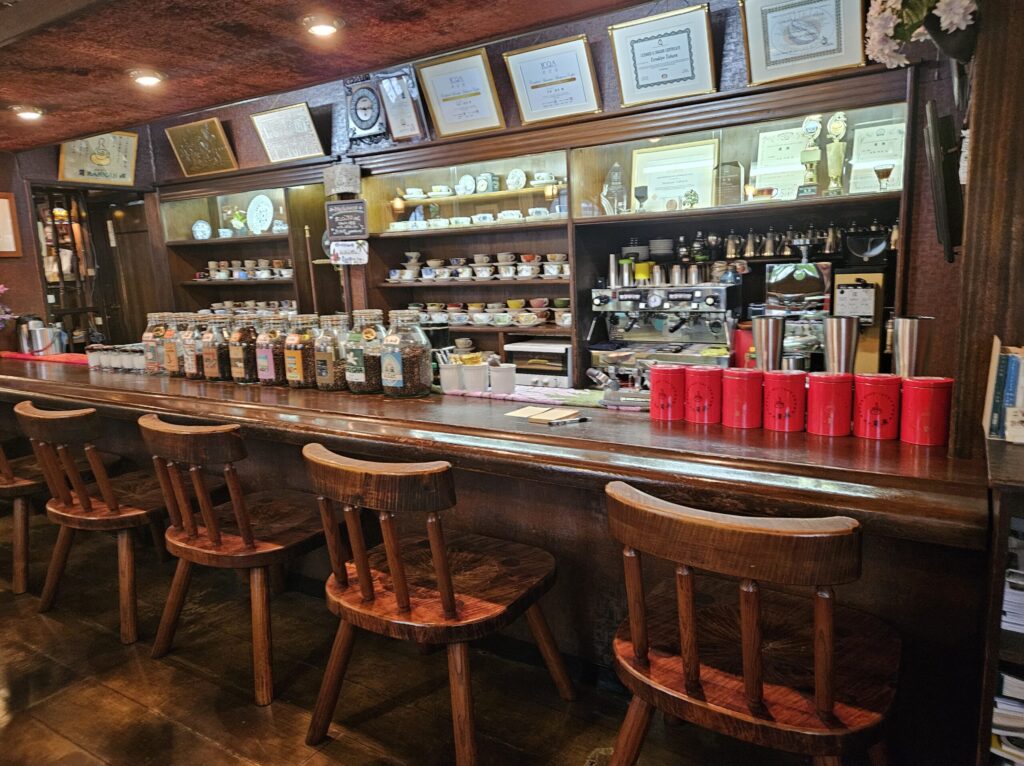Retro Showa-style interior of Café Ran Kan near Dazaifu Tenmangu, with warm and cozy atmosphere.