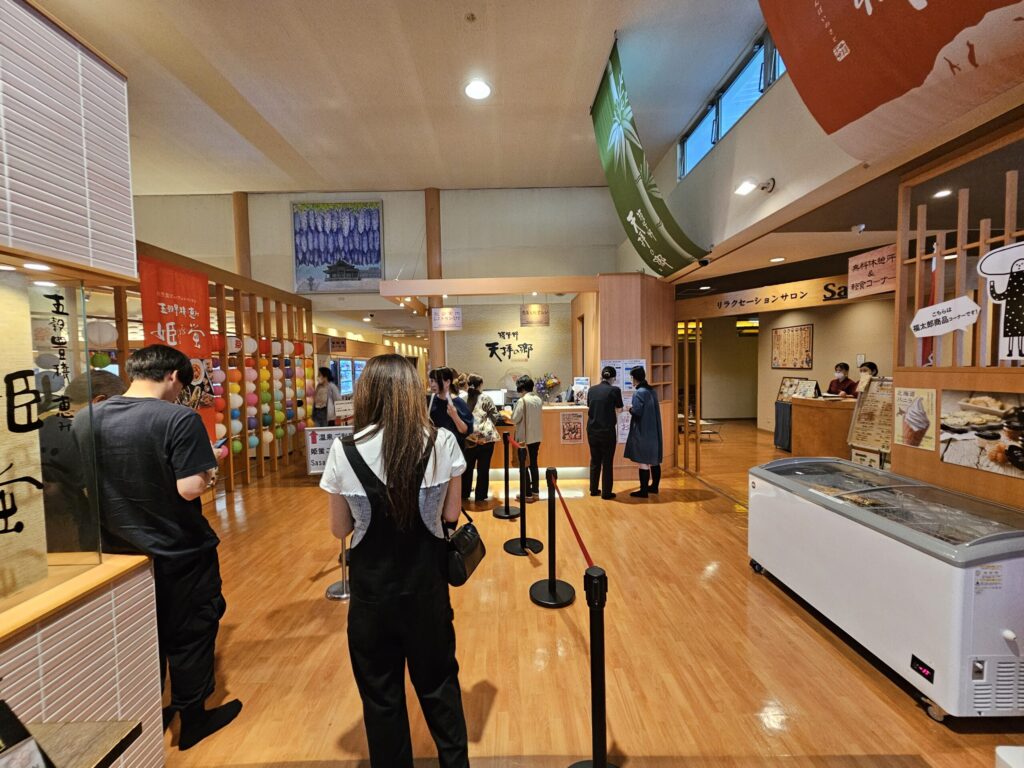 Buffet reception counter at Tenpai no Sato, a restaurant in Chikushino near Dazaifu Tenmangu Shrine.