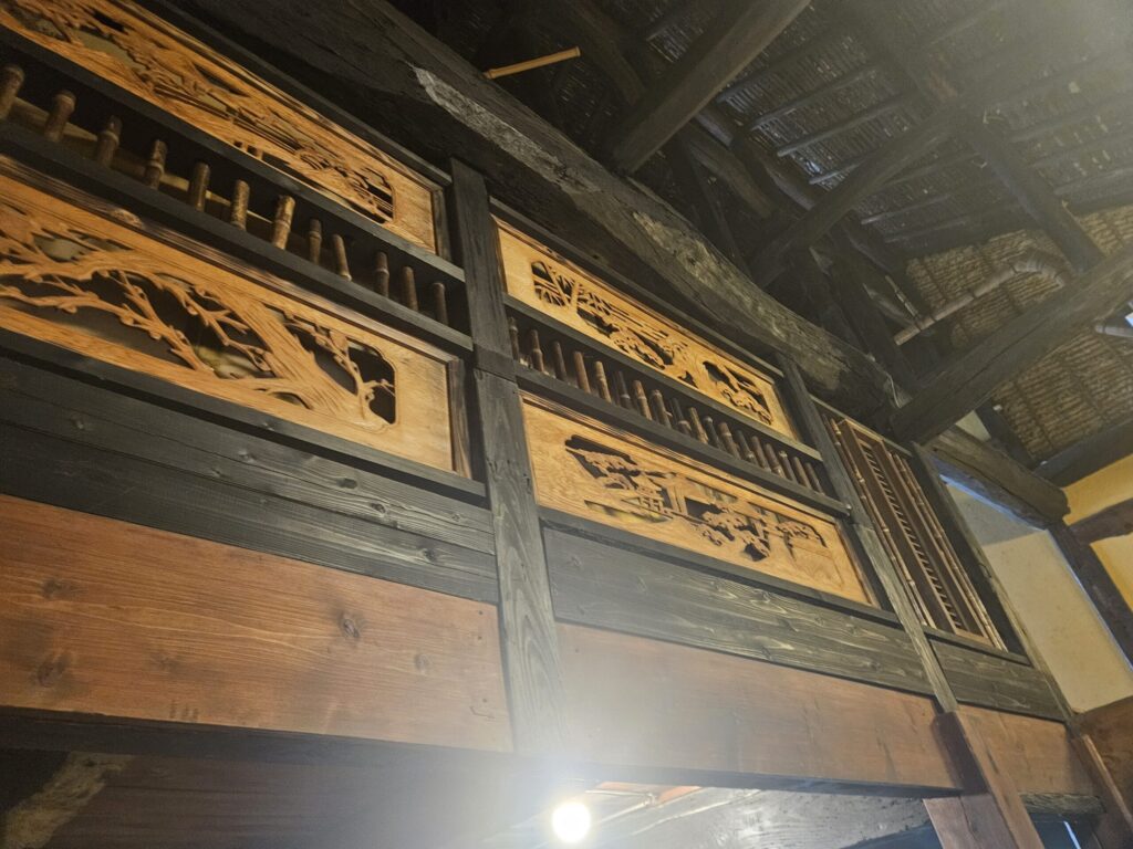 Wooden ceiling beams inside the traditional Japanese house of Namiman restaurant