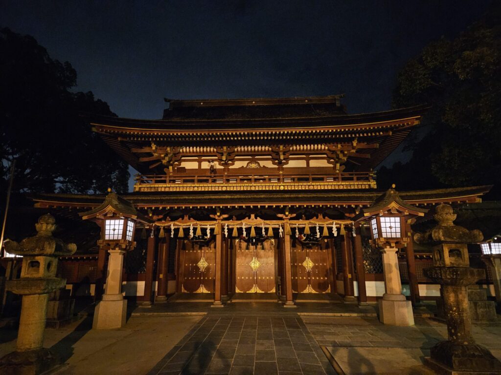 The Romon Gate of Dazaifu Tenmangu at night without the dragon lantern, showing its calm and dignified atmosphere.
