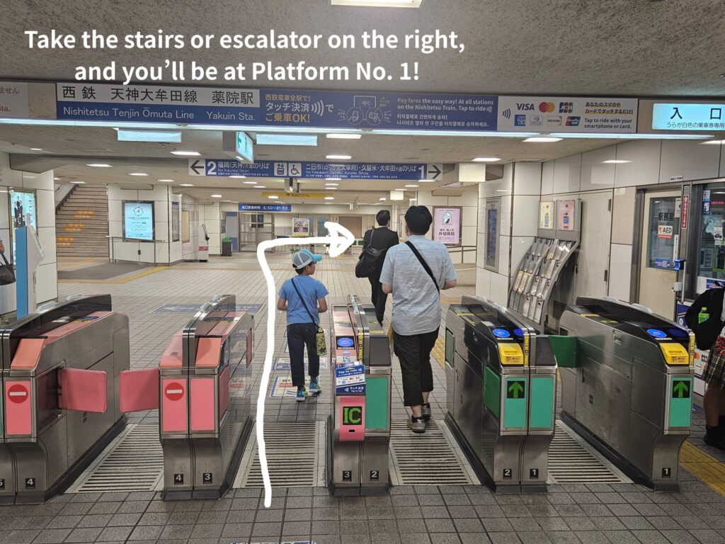 Ticket gates at Nishitetsu Yakuin Station, entrance for transfers to the Dazaifu Line.