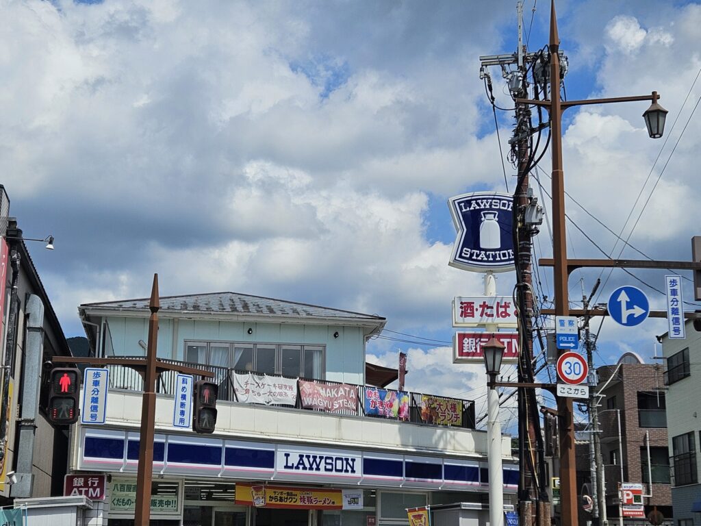 Exterior of Chuta no Kissa café near Dazaifu Tenmangu Station, located on the second floor above a Lawson convenience store.